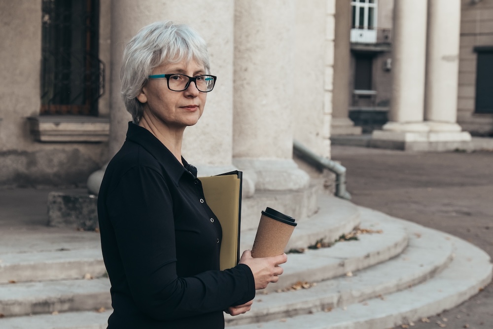 Middle aged attorney woman with glasses